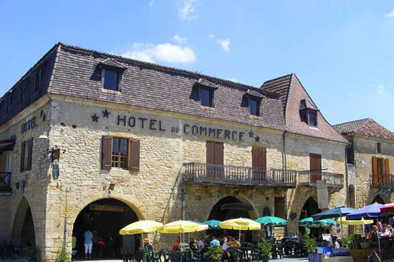 Market stalls in the square at Villefranche-du-Perigord